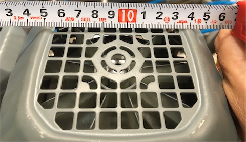 This grille prevents touching fan blades.