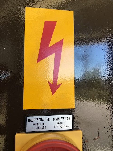 This historic main disconnect is marked by outdated rectangular lightening symbol.